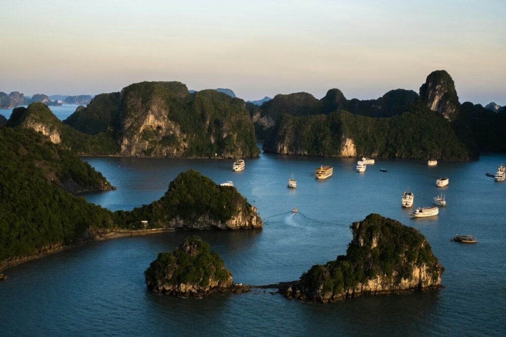 Boats among the karst islands of Ha Long Bay
