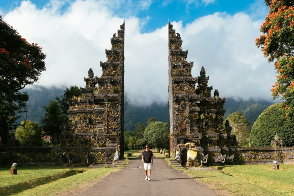 A traveller walking through the Handara Gate, Bali