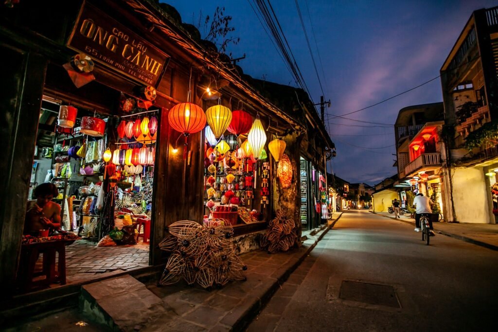 A lantern-lit street in Hoi An's old town at night