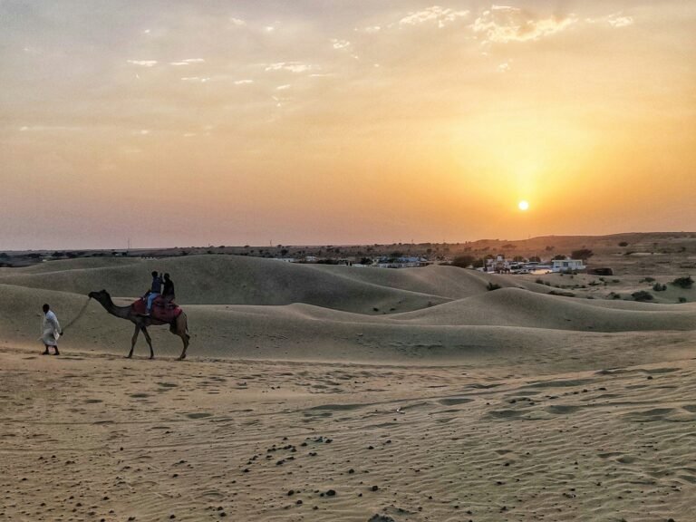 A camel ride on the Sam sand dunes near Jaisalmer at sunset